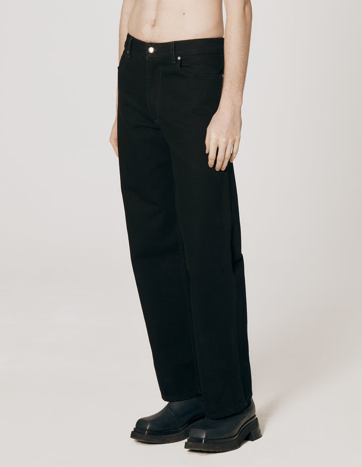 Our classic high waisted four pocket jean with a wide leg. Back pockets are cut in signature "L" shape. Cut in almost black light enzyme washed denim. 100% cotton, made in Los Angeles. Unisex fit, female model wears size 27, male model wears size 30.