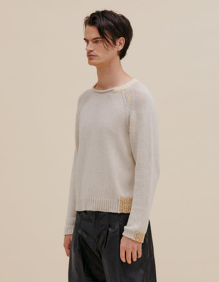 Raglan-sleeve ribbed sweater made from a cotton and linen yarn blend. Contrasting color patches around hem, neckline and cuffs. Funnel neck with novel yarn details. Models wear size M. 49% cotton, 49% linen, 2% poly. Made in China.