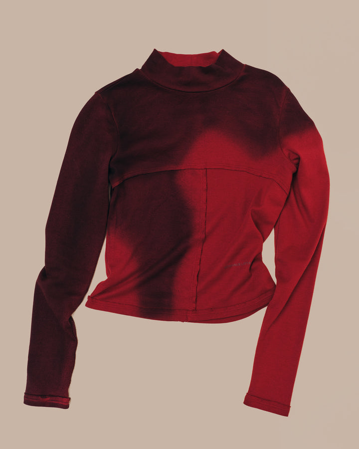 LAPPED BABY TURTLENECK IN MAROON BLUR