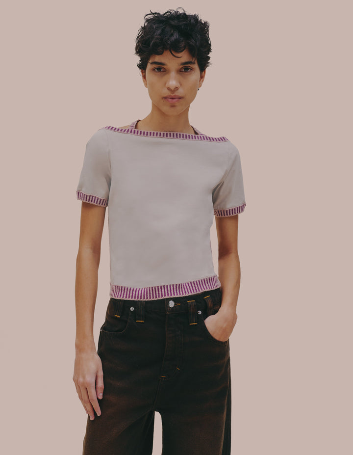 Eckhaus Latta backless top with knit trim. 