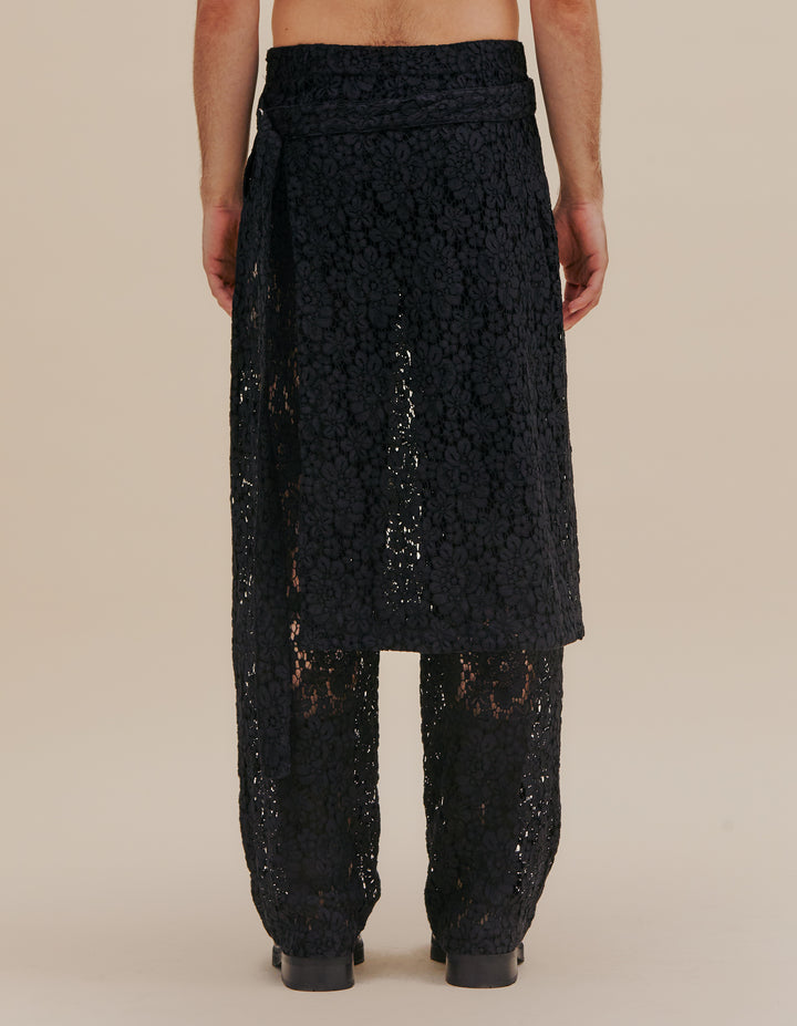 Italian floral lace pant with a detachable three-quarter length skirt layer, complete with an adjustable belt and slider. This pant has a natural rise with a straight leg and side seam pockets. Models wear size S. 55% cotton, 27% nylon, 18% viscose. Made in China. This style runs large, we suggest sizing down.