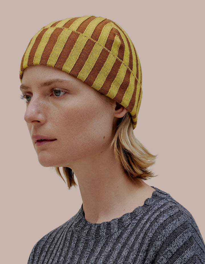 Eckhaus Latta knit beanie in sulphur. 