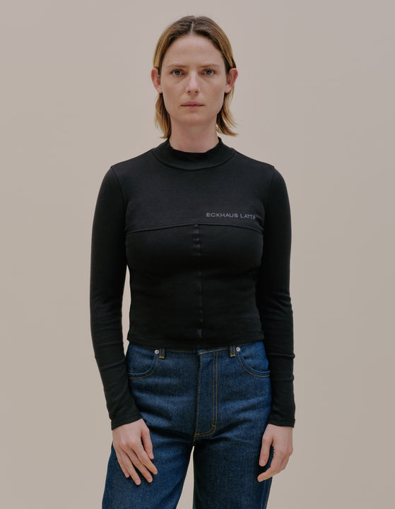 LAPPED BABY TURTLENECK IN BLACK