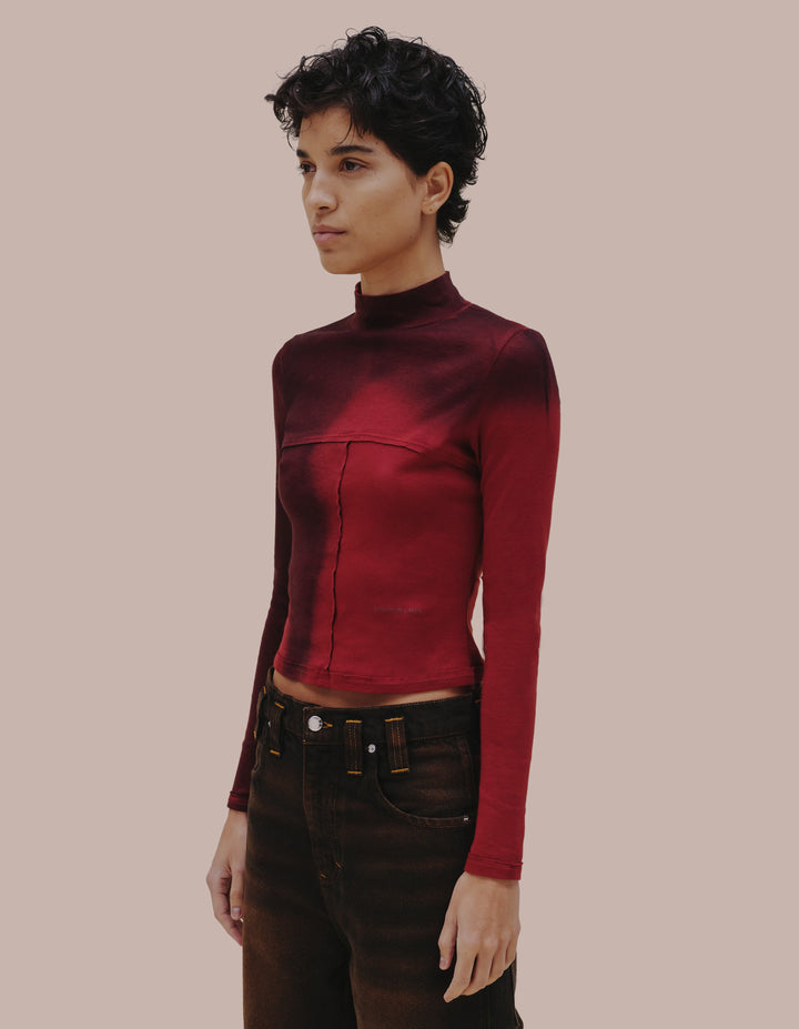 Eckhaus Latta turtleneck in maroon blur. 