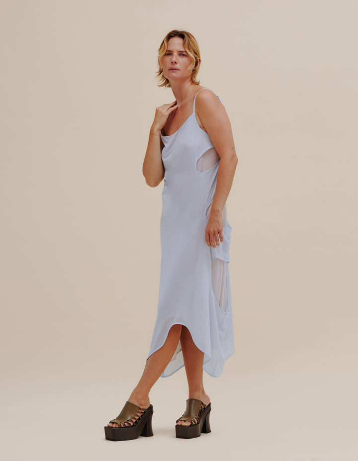 Cascading spaghetti strap midi dress in a layered, wispy blue, tissue-weight jersey.&nbsp; Relaxed fit with a shaped hemline, finished with&nbsp;our classic logo screenprinted at center back neckline. Straps are adjustable. Model wears size S. 85% polyester, 15% rayon. Made in China.