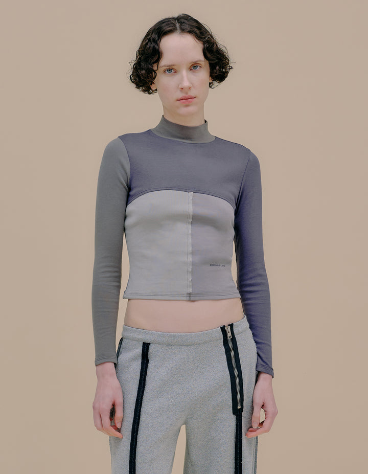 LAPPED BABY TURTLENECK IN TONAL SHADOWS